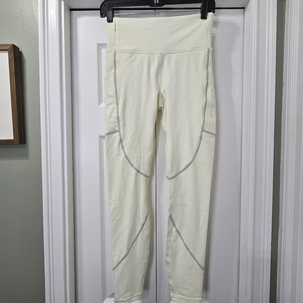 Fabletics Thermo Flex High Waisted Reflective Pocket Leggings Warm White Size S